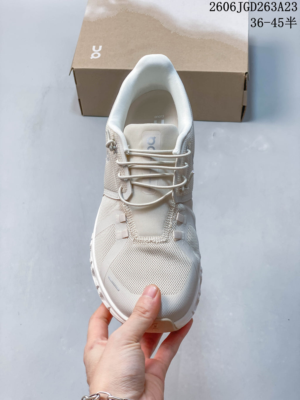 Top view of an On Cloudtilt Remix sneaker showing its lacing and upper