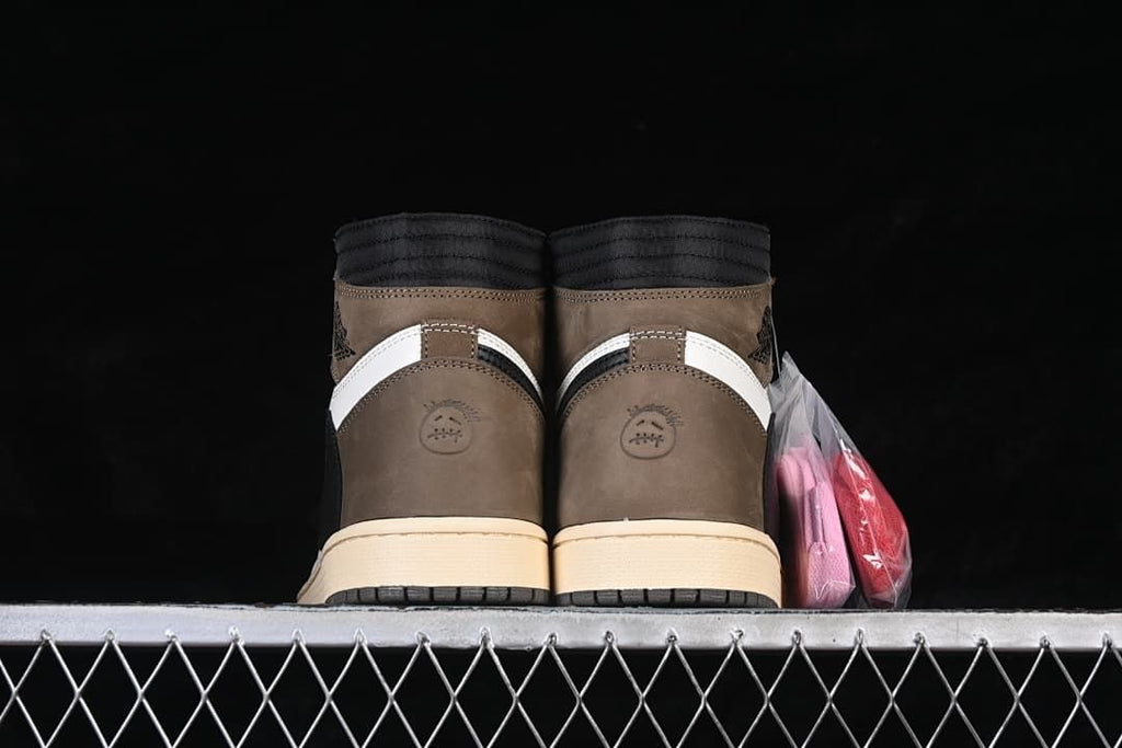 Rear view of both sneakers with brown heel panels