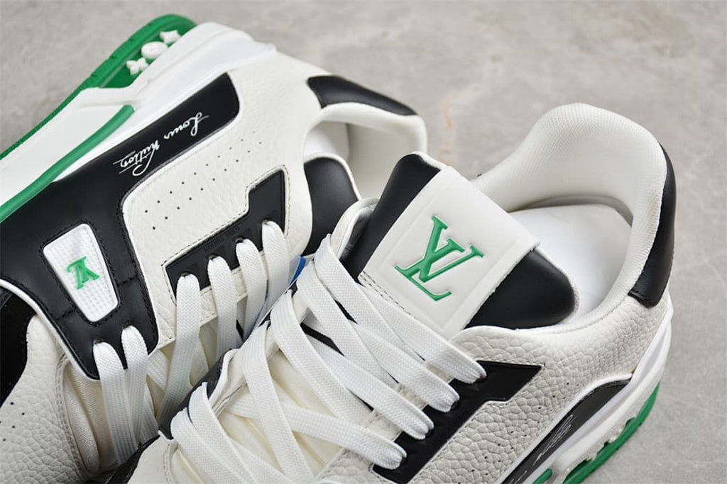 Close-up of the LV Trainer shoes showing the laces, tongue branding and perforated panels.