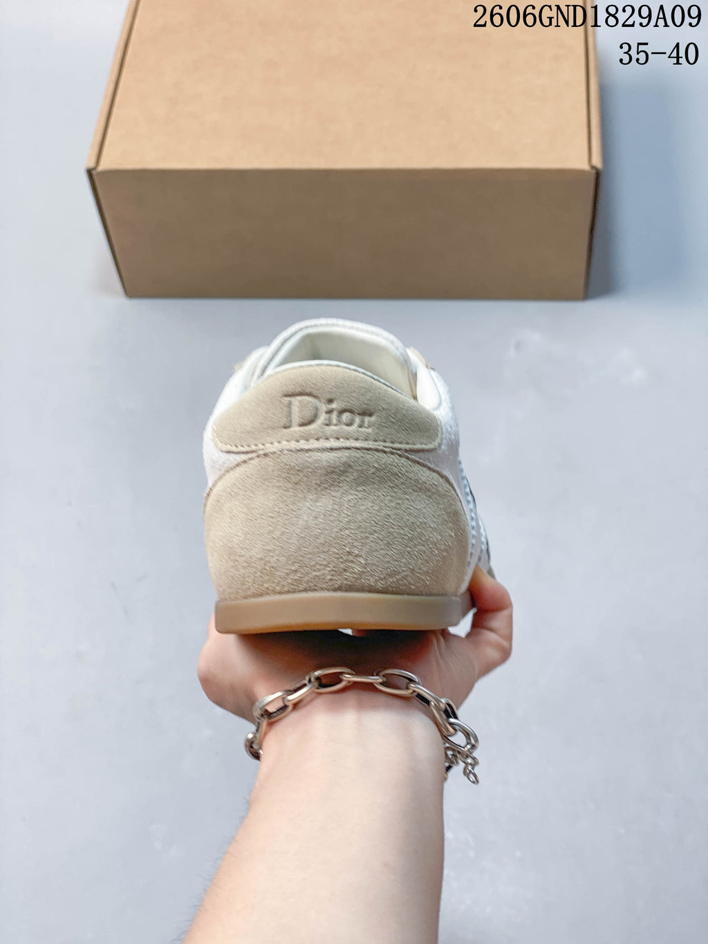 Rear view of the sneaker with Dior lettering on the heel