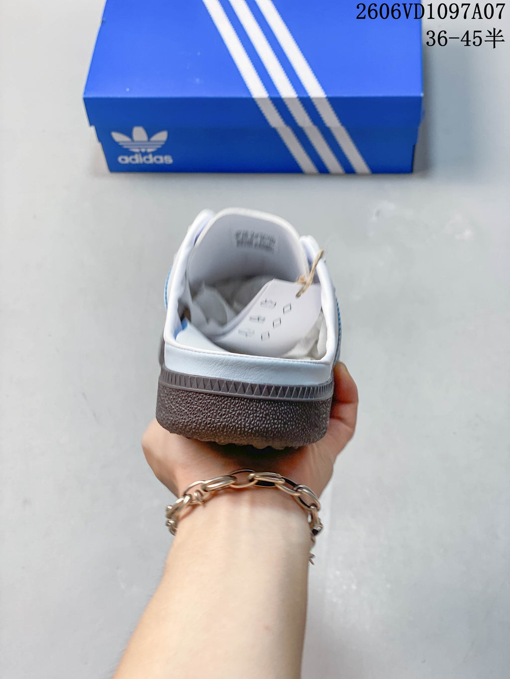 Rear view of the open heel and textured outsole on an adidas Samba OG mule