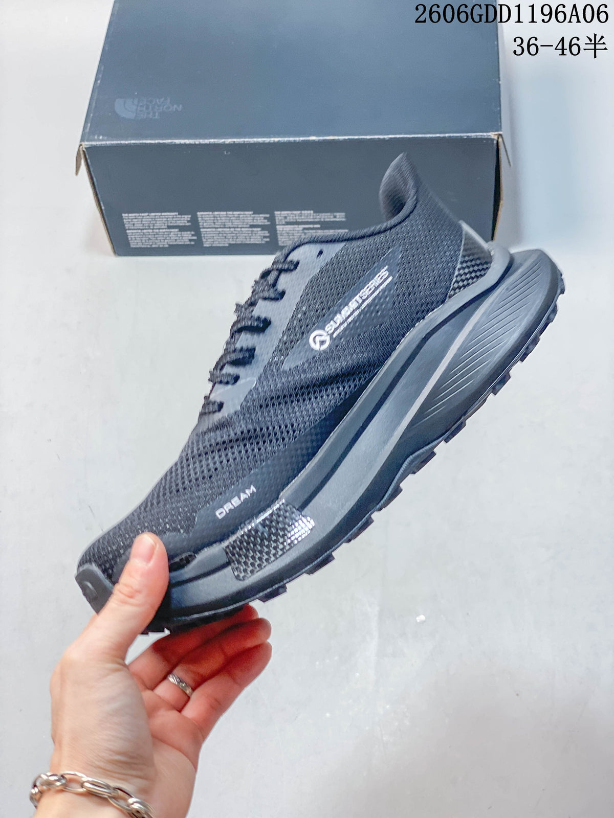 Side view of a gray The North Face Summit trail shoe