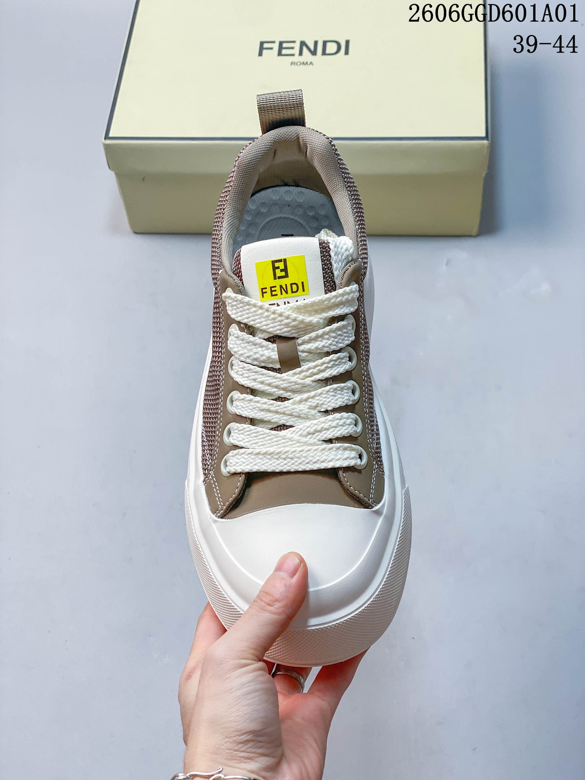 Top view of the sneaker showing white laces, taupe panels and padded collar