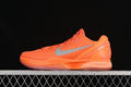 Side view of orange Nike Kobe VI Protro basketball shoe with metallic silver Swoosh