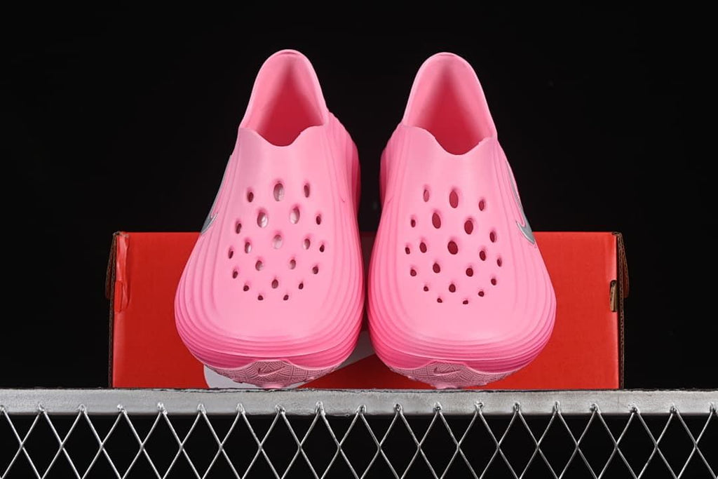 Front view of the pair showing perforated uppers and open heel openings.