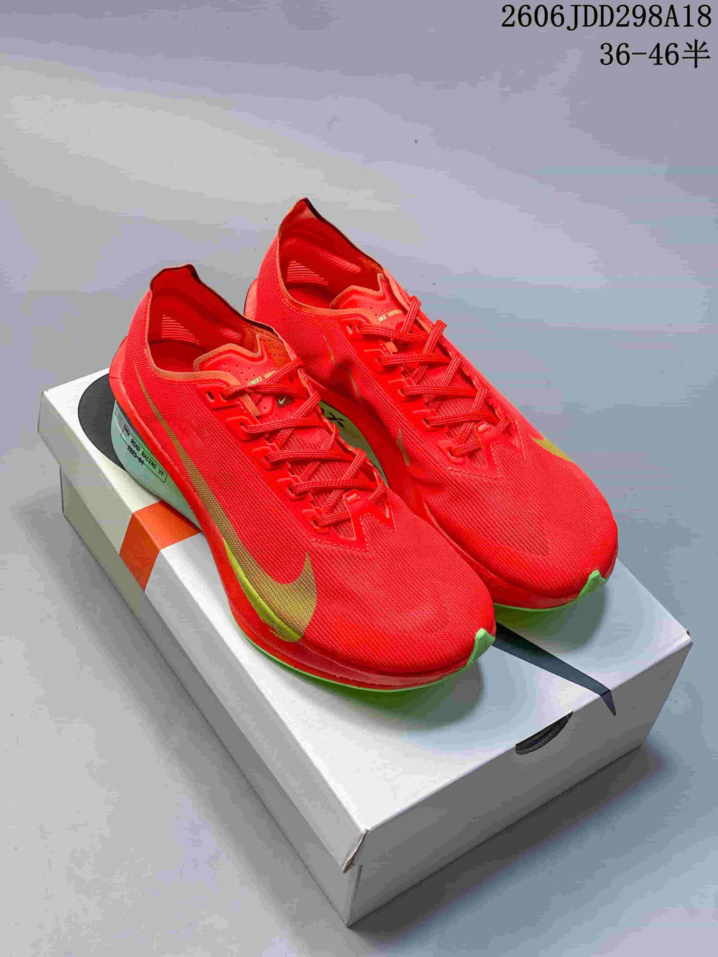 Four Nike road racing shoes shown side by side in different colorways.
