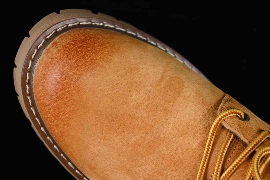Top view of the boot's rounded toe and lace area