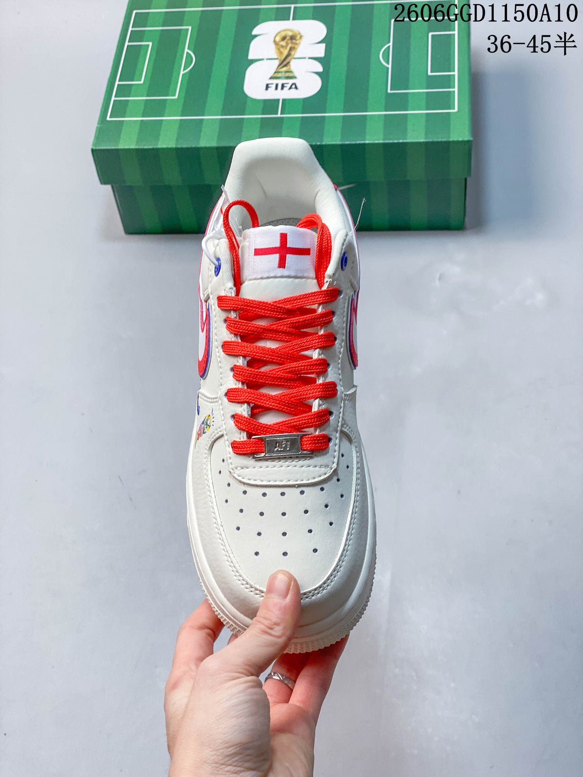 Front view highlighting red laces and perforations on the toe