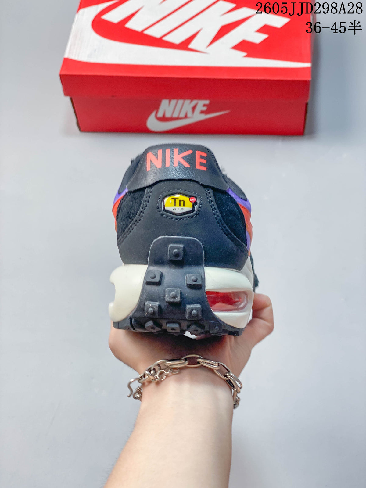 Rear view showing the heel and visible Air unit of the Nike Air Max Waffle SP