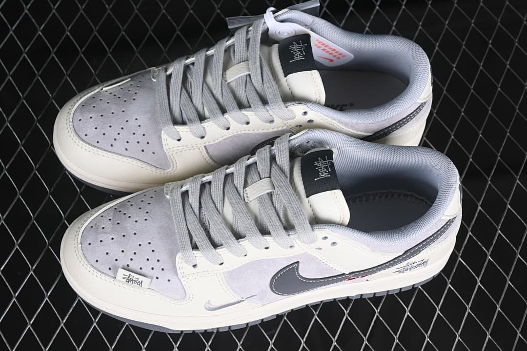Pair of off-white and grey low-top sneakers shown from above