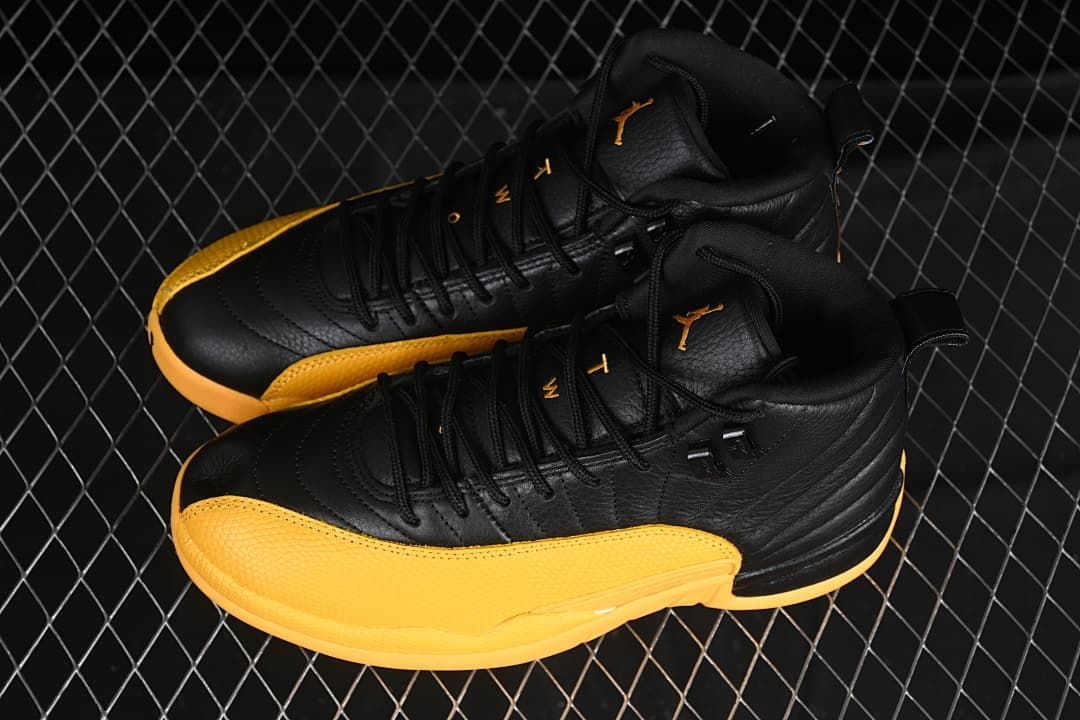 Pair of black and gold high-top sneakers viewed from above