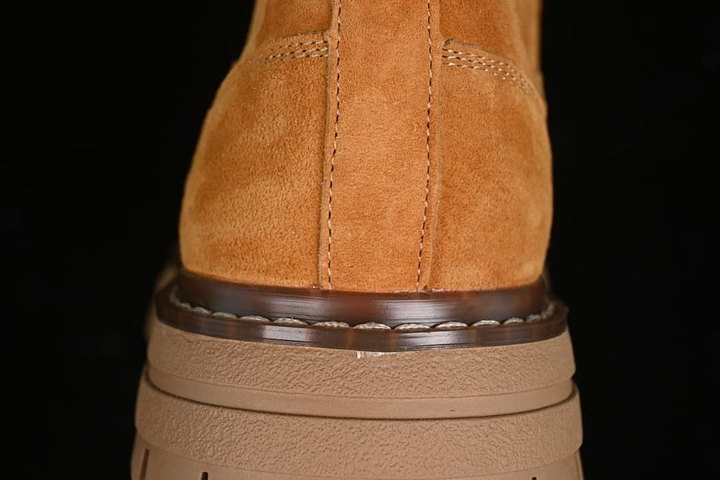 Rear close-up showing stitched upper and layered heel sole.