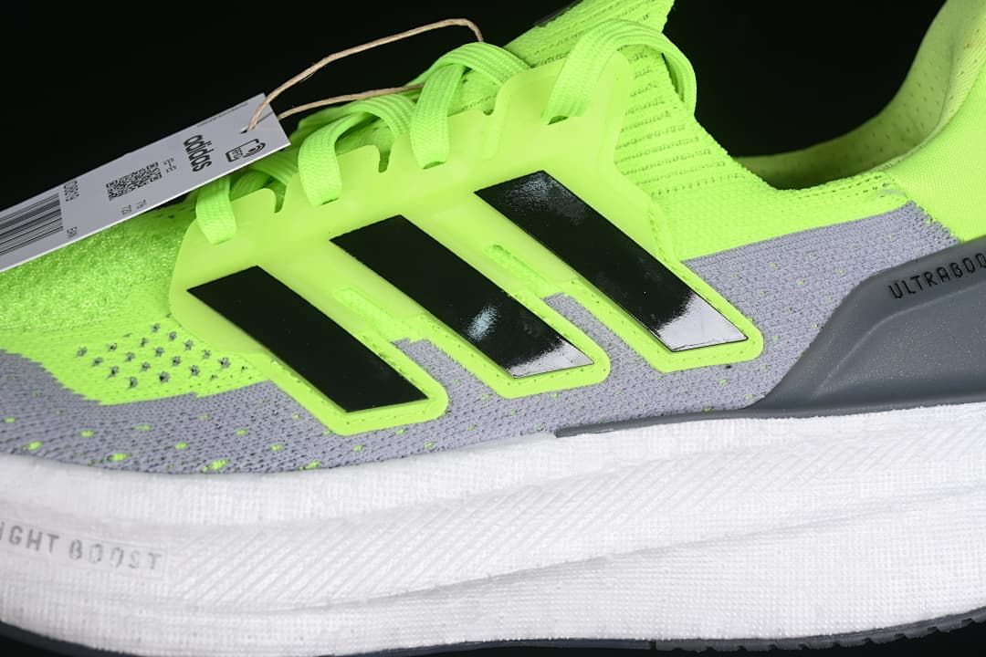 Close-up of the side stripes, upper, and midsole