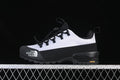 Side view of a white and black The North Face Glenclyffe Low shoe.