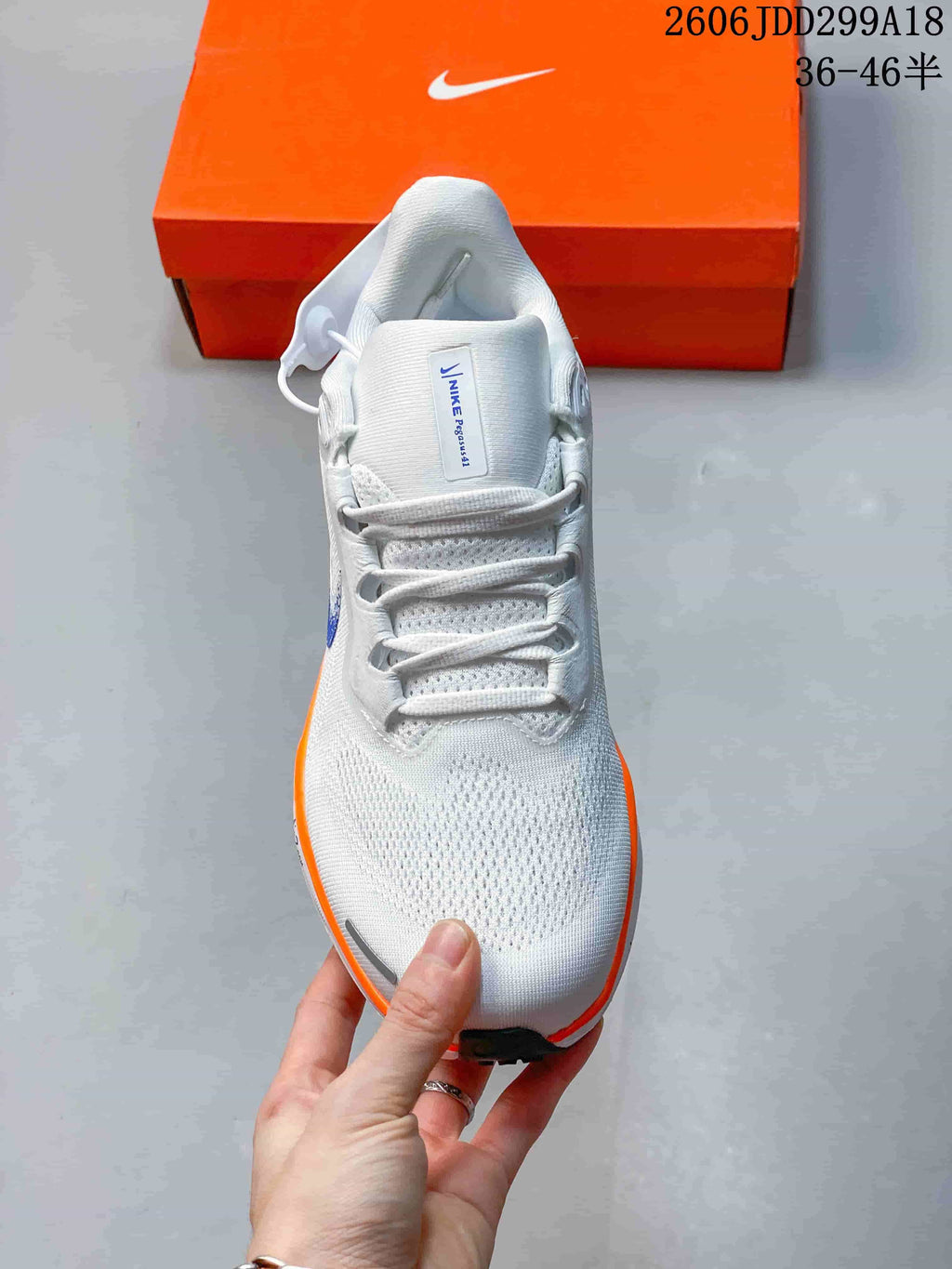 Top view of the white Nike Pegasus 41 shoe showing its laces and mesh-look upper.