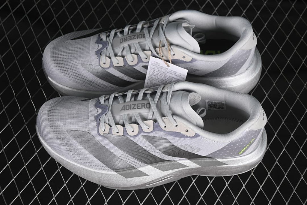 Pair of gray Adizero Evo SL running shoes shown from above and the side.