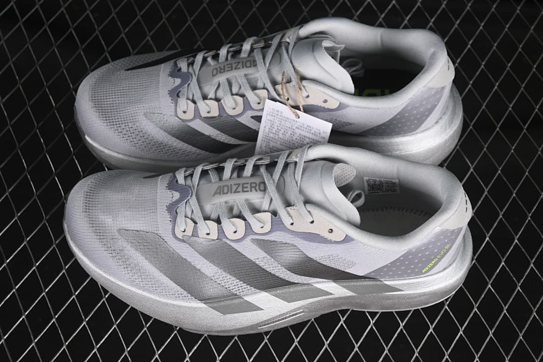 Pair of gray Adizero Evo SL running shoes shown from above and the side.