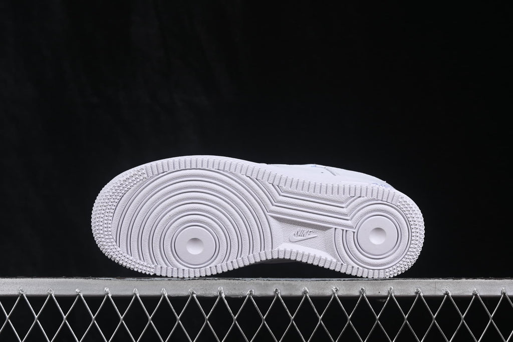 Underside view showing the white circular rubber outsole pattern.