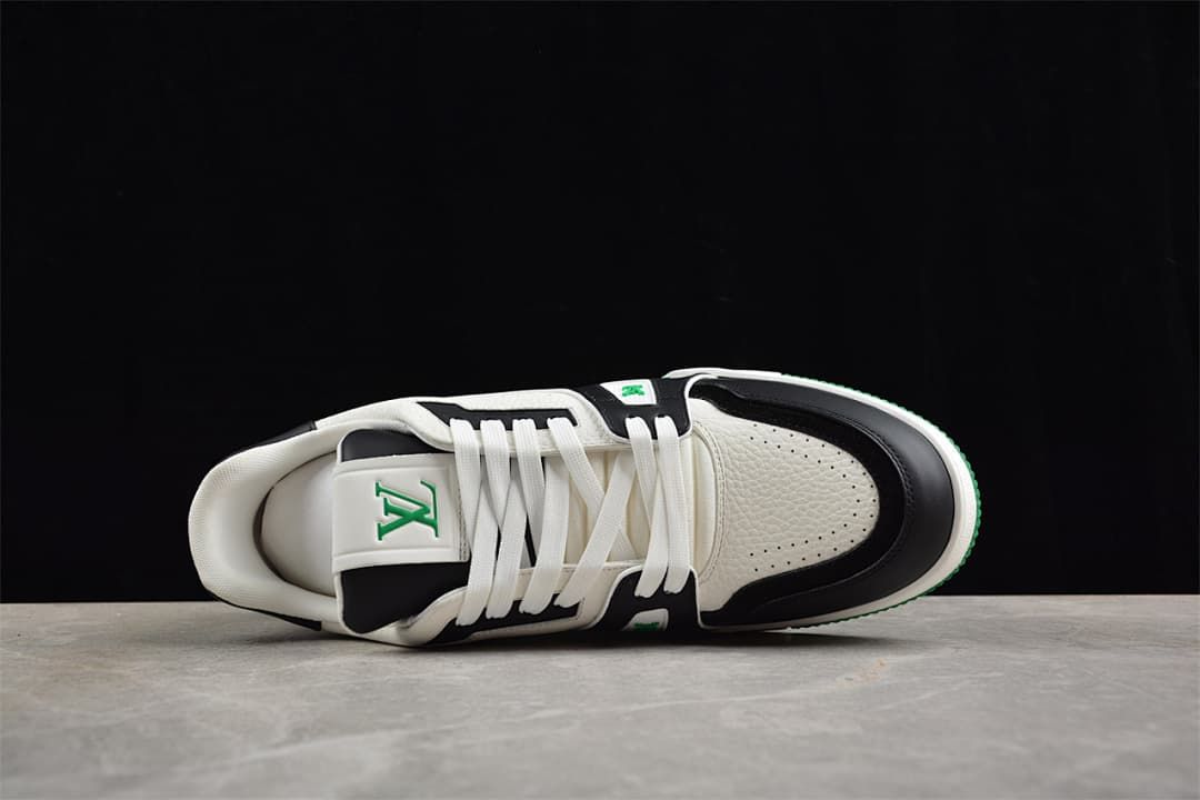 Top-down view of the sneaker showing its laces, tongue and perforated toe.