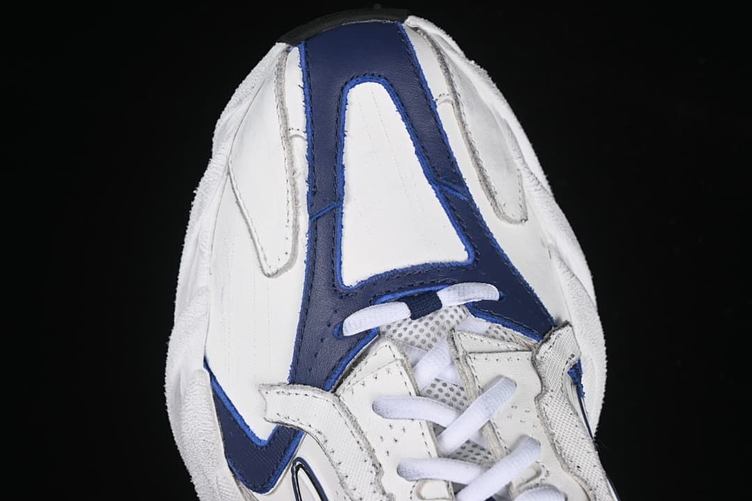 Top-down view of the sneaker toe and lace area.