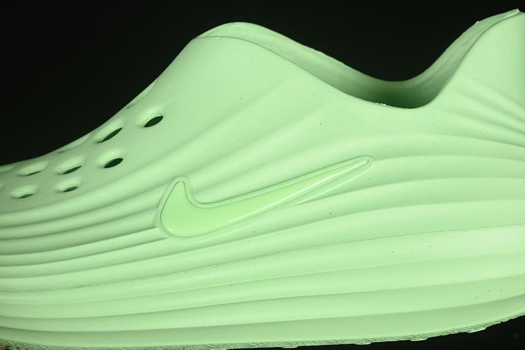 Close-up of the side Swoosh and perforated upper