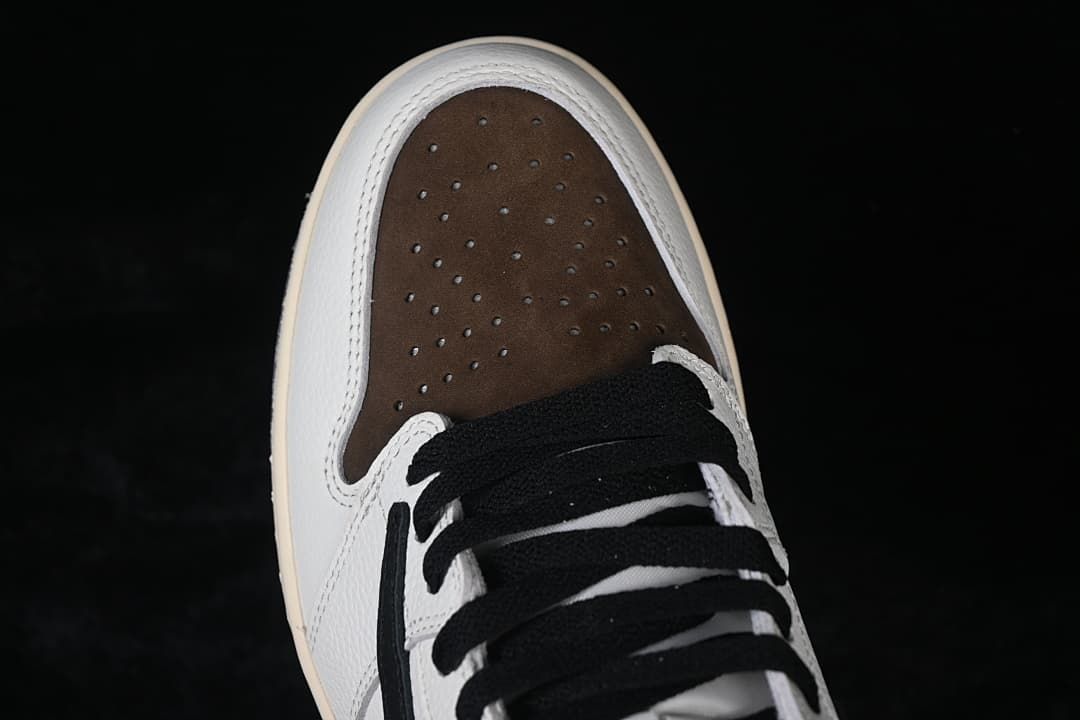 Top view showing perforated brown toe and black laces