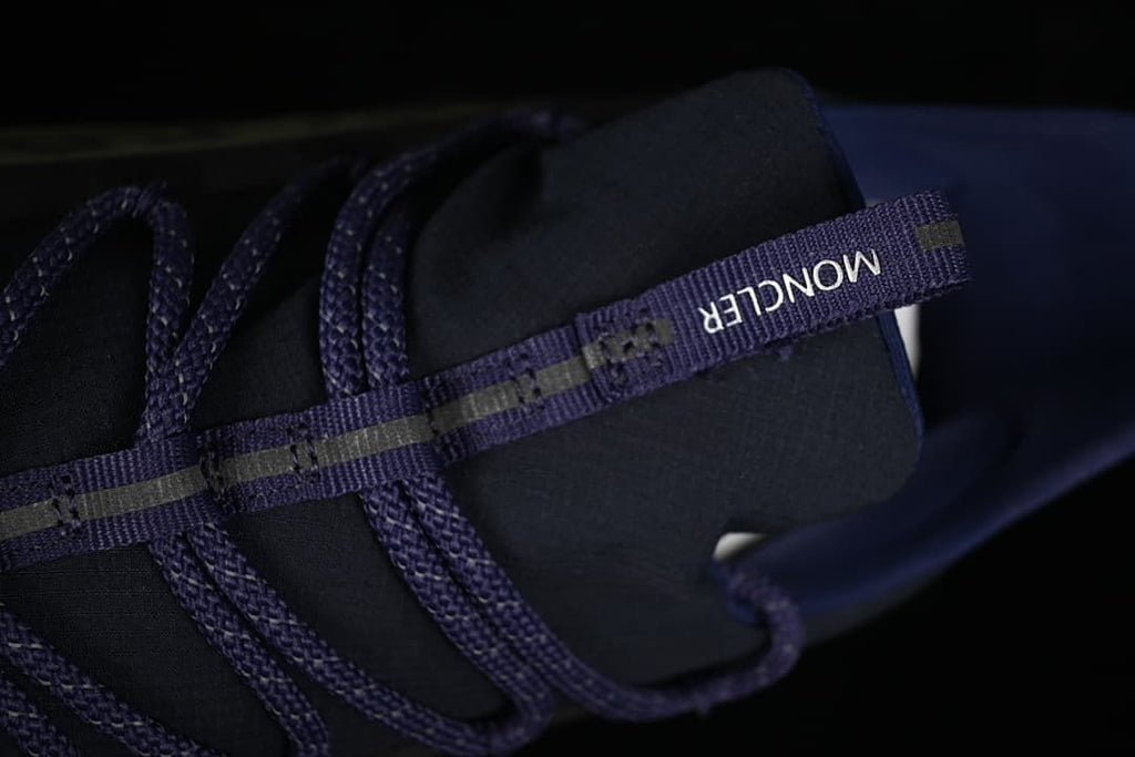 Close-up of the tongue and branded lace detail