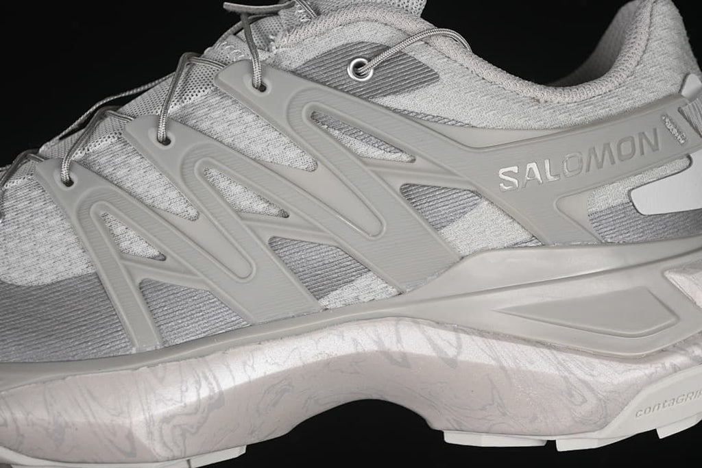 Close-up of the side structure, laces and Salomon branding