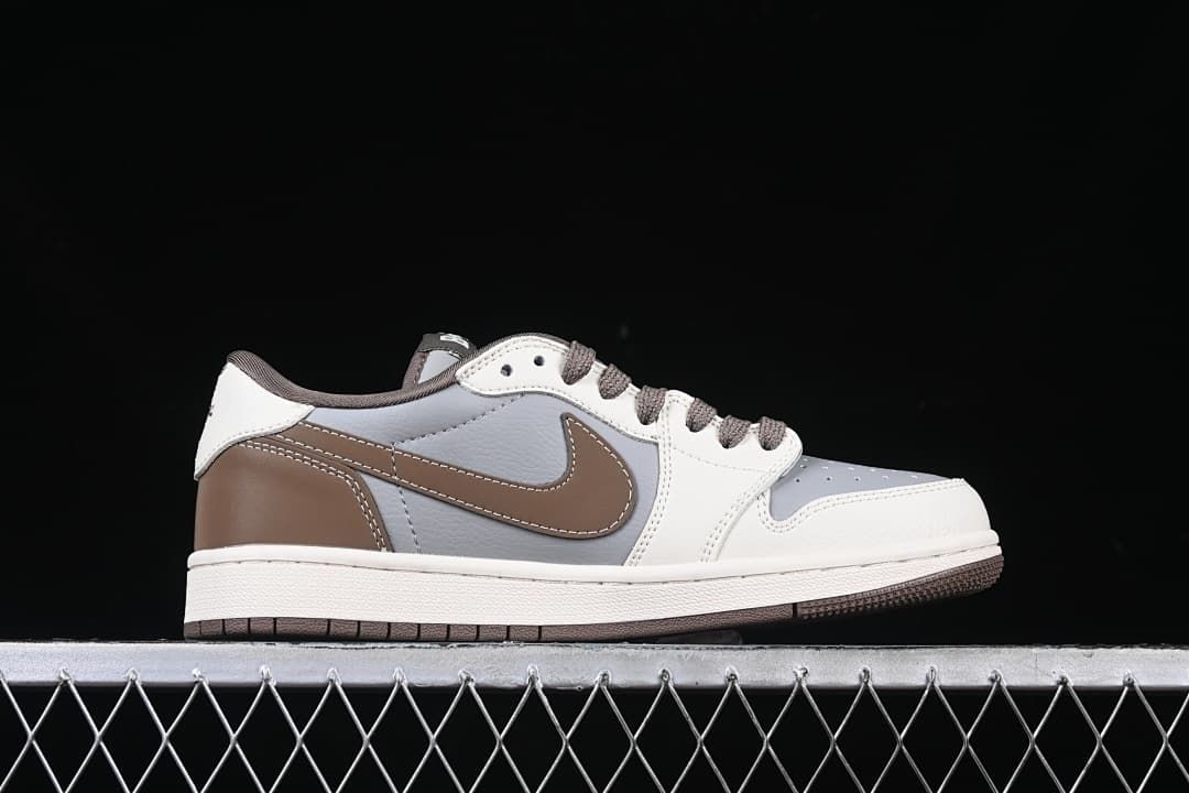 Side profile of the low-top sneaker with brown Swoosh and gray mid-panel.