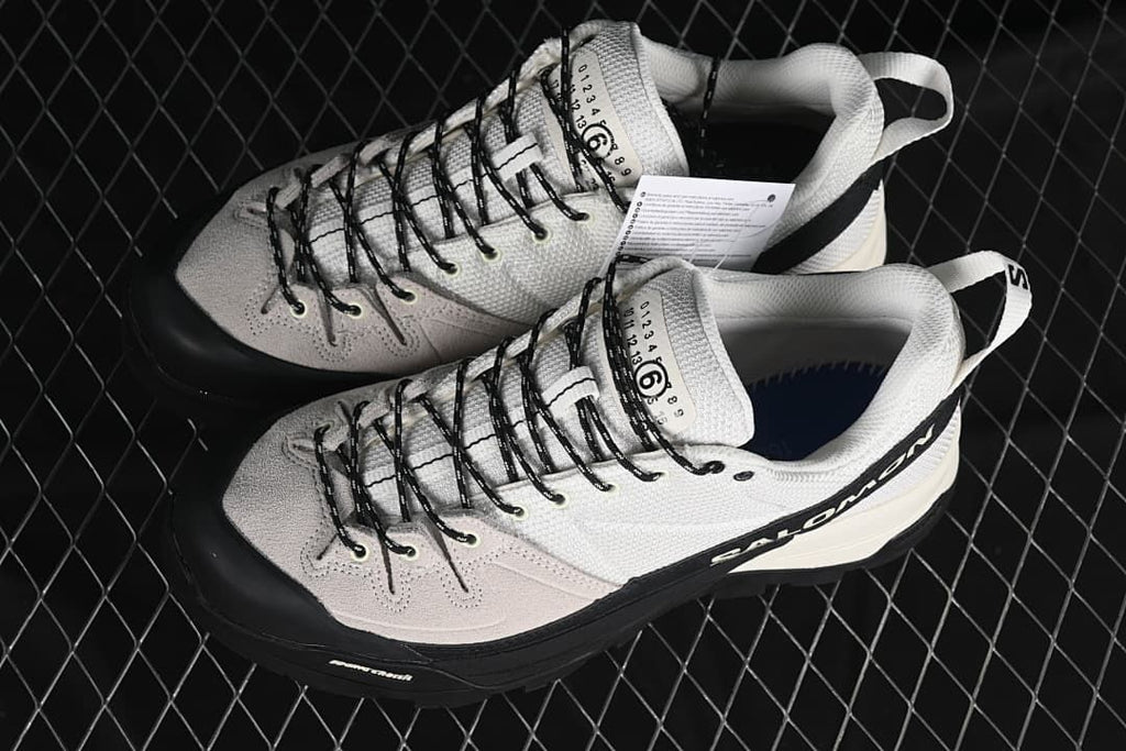 Pair of Salomon X-ALP MM6 sneakers shown from above