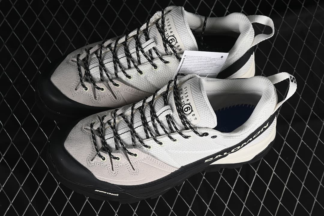 Pair of Salomon X-ALP MM6 sneakers shown from above