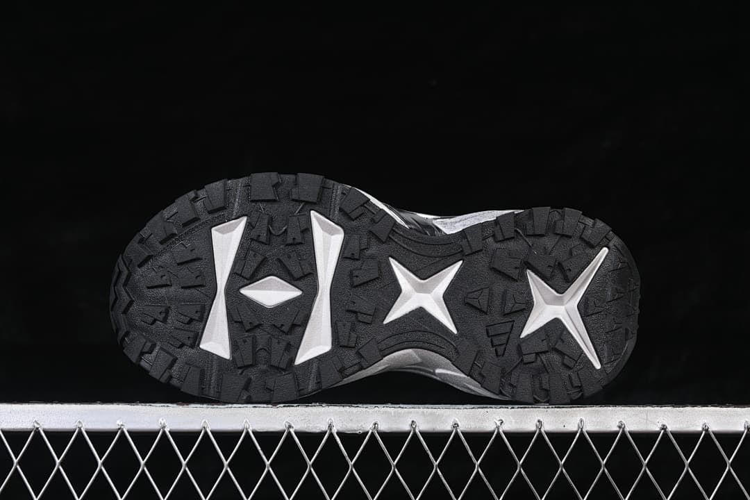 Underside view showing the patterned black outsole