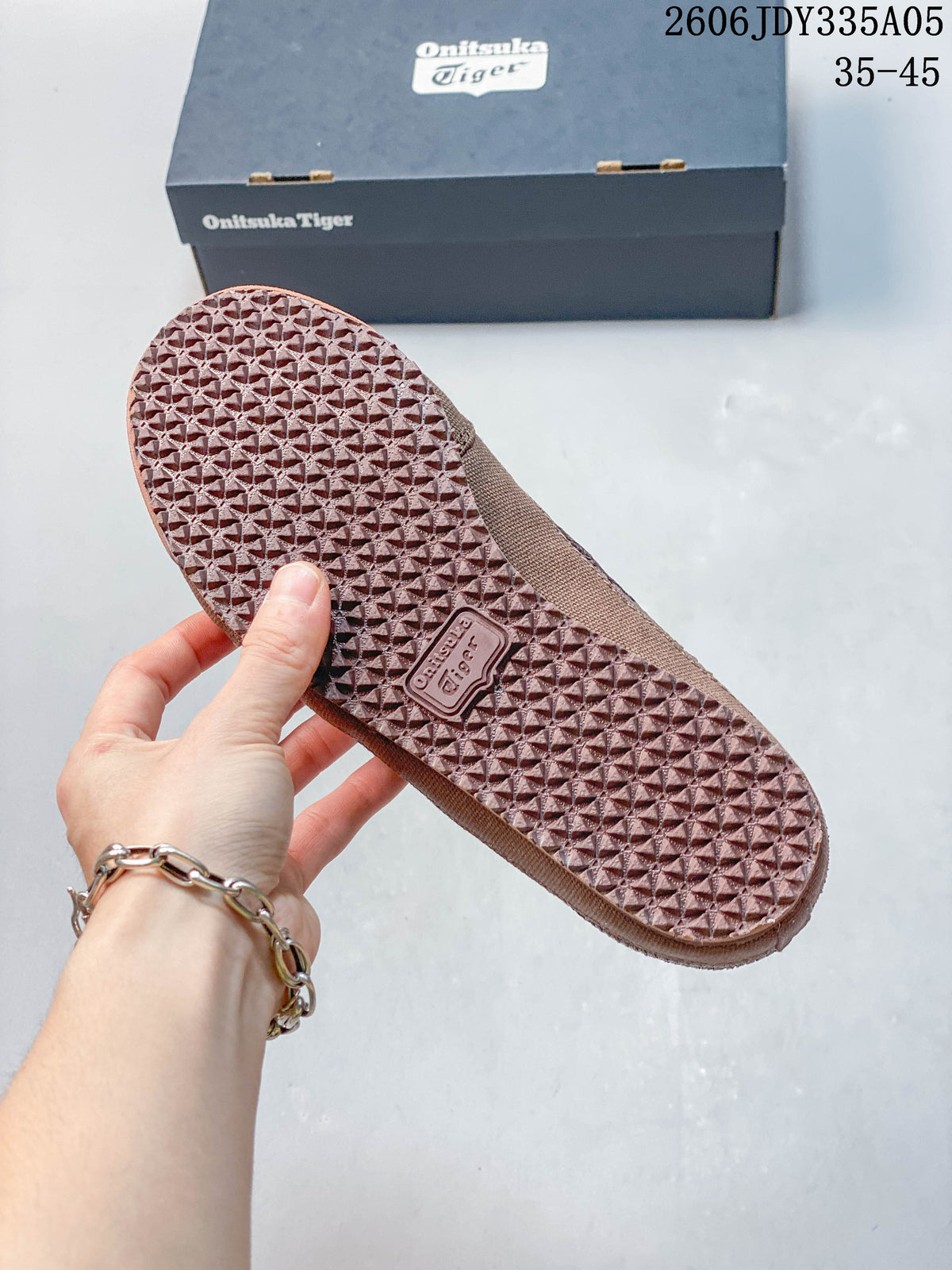 Textured outsole of the brown Mexico 66 Sabot shoe