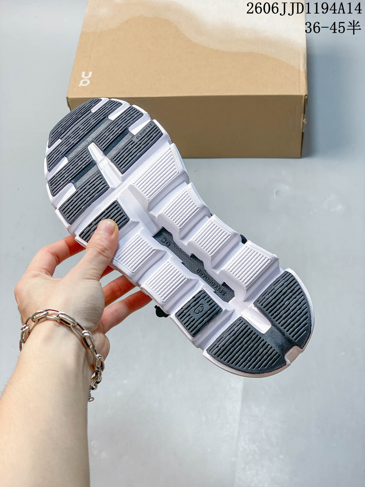 Underside of the Cloud 6 Versa shoe showing its segmented white outsole and dark tread areas