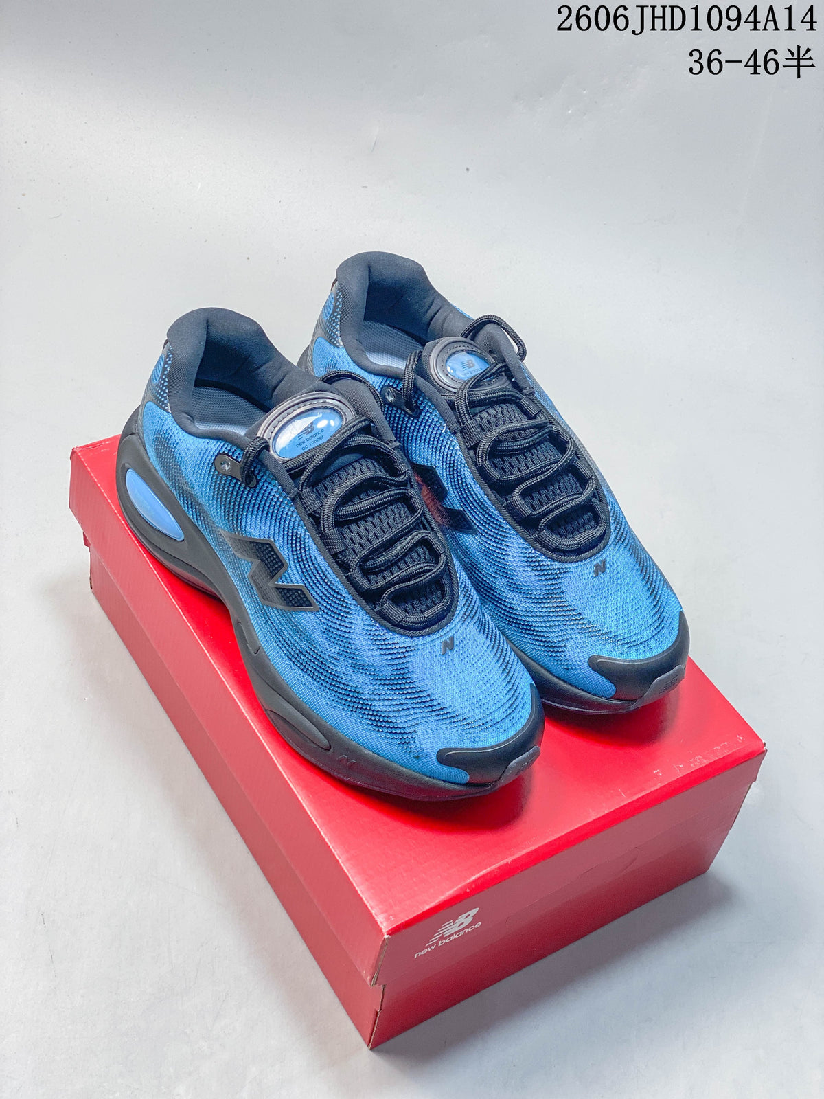 Pair of blue and dark gray New Balance AC Runner low-top shoes on a red box