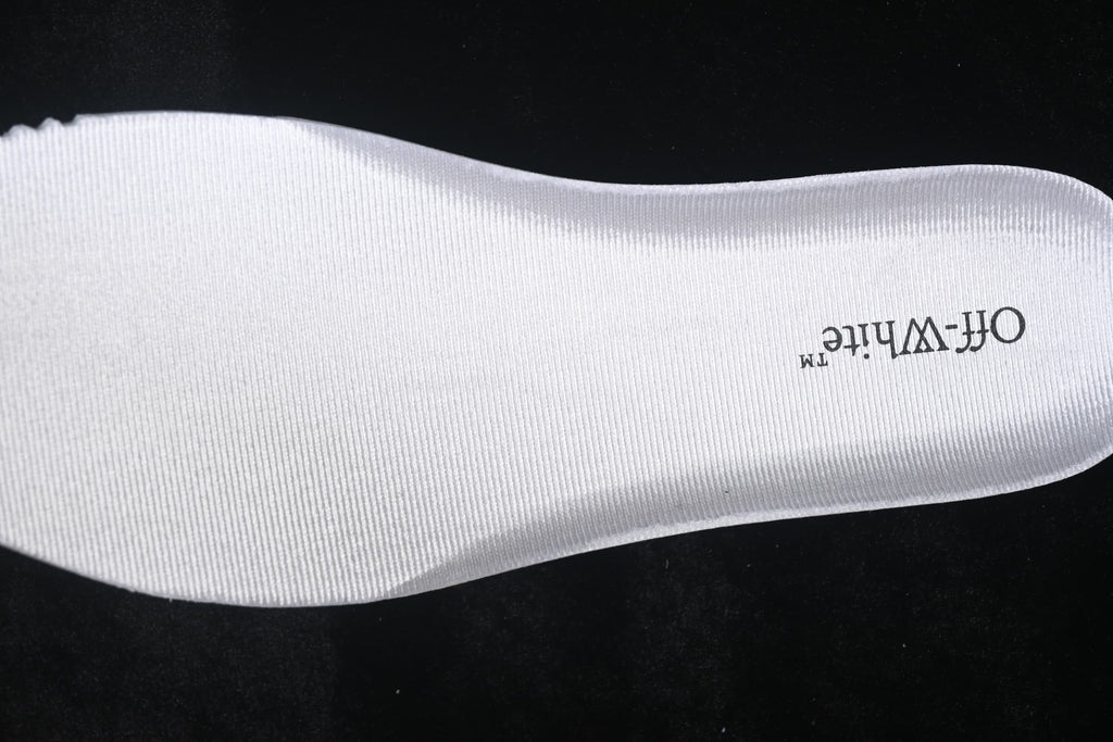 Close-up of a white insole with Off-White branding