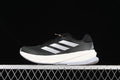 Side view of a black adidas Supernova Rise W running shoe with white stripes and a light-colored midsole.