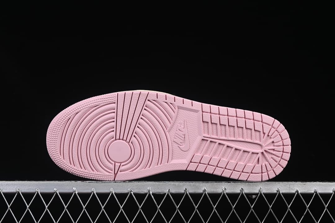 Underside view of the pink rubber outsole