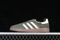 Side view of dark green Adidas Handball Spezial sneakers with white stripes and gum-colored sole