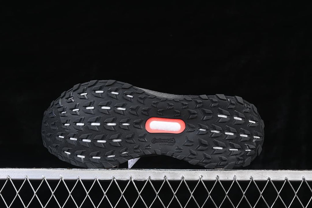 Underside view showing the textured black outsole