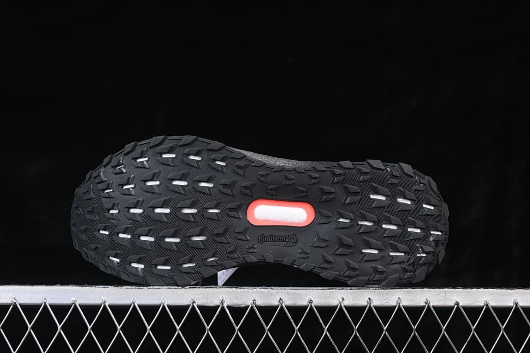 Underside view showing the textured black outsole