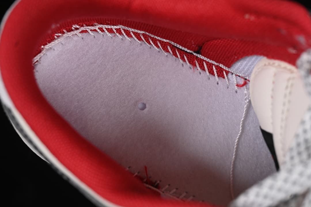 Close-up of the red-lined shoe interior