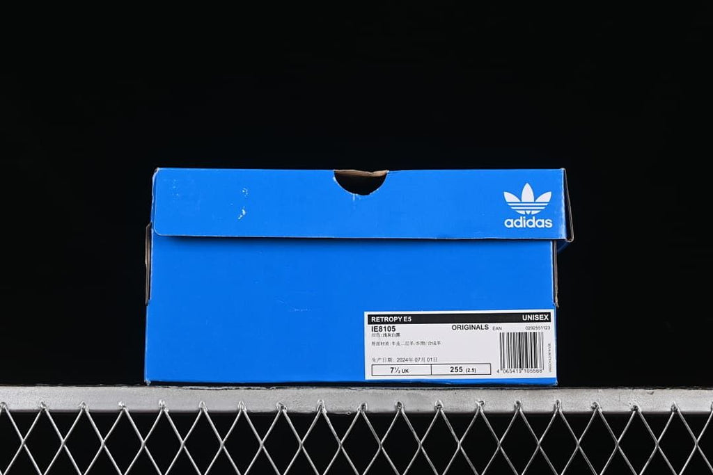 Blue adidas shoe box with a Retropy E5 IE8105 label.