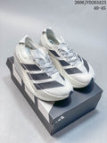 White Adidas Adizero Dropset Elite shoes with dark three-stripe detailing displayed on a shoebox; image overlay states sizes 40–45.