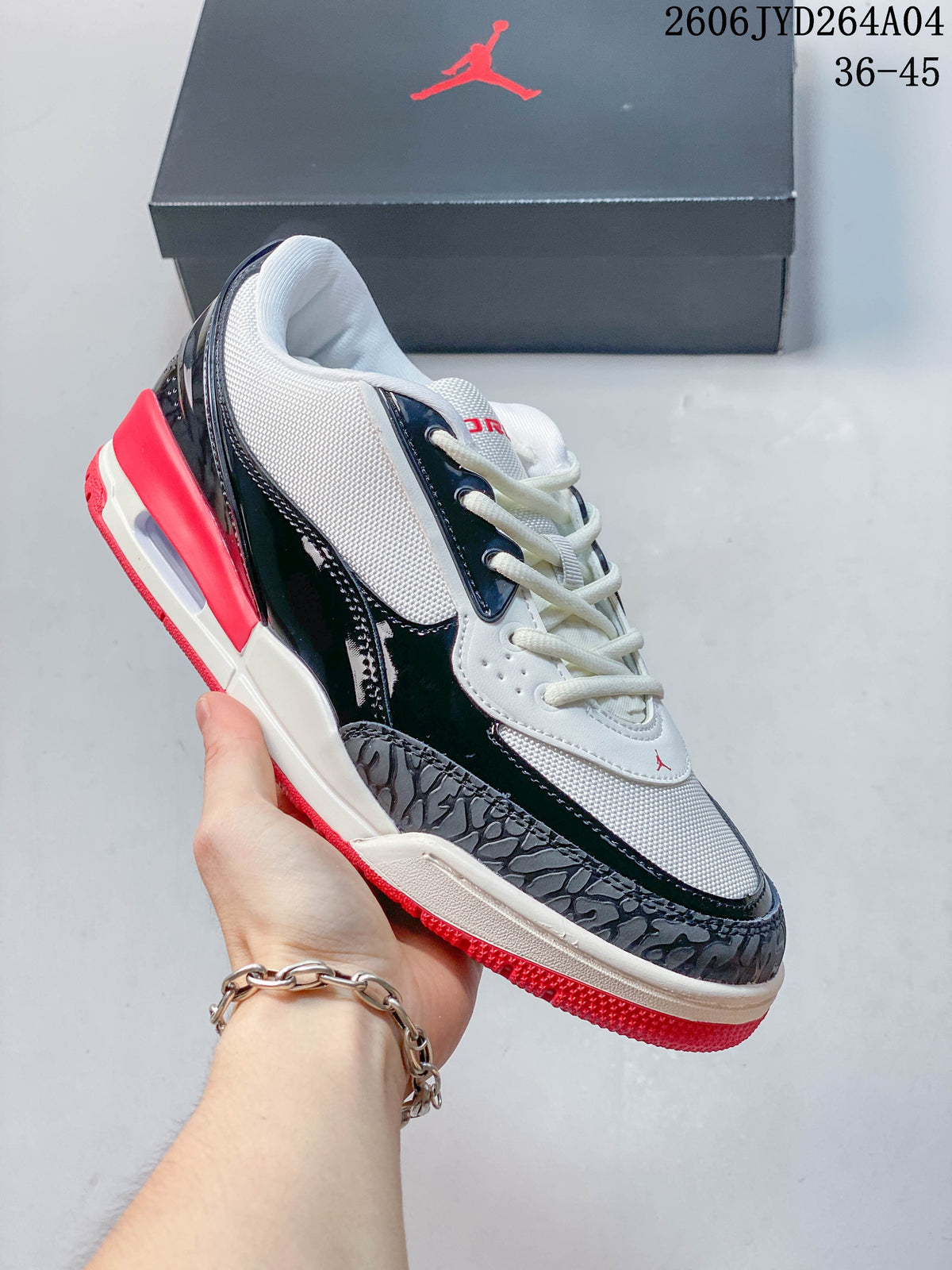 Side view of the white, navy, and red Jordan Air Jordan Ultra sneaker