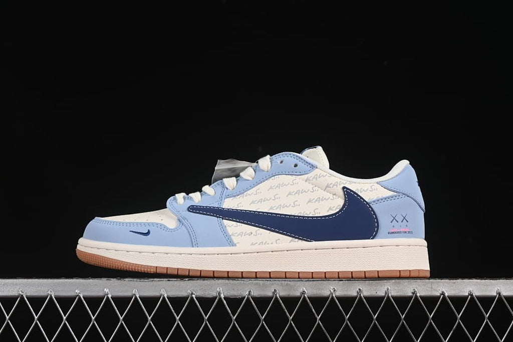 Side view of a light blue, navy, and off-white low-top sneaker with patterned panels and a gum-colored outsole