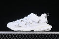 White Balenciaga Track Piercing sneaker shown from the side