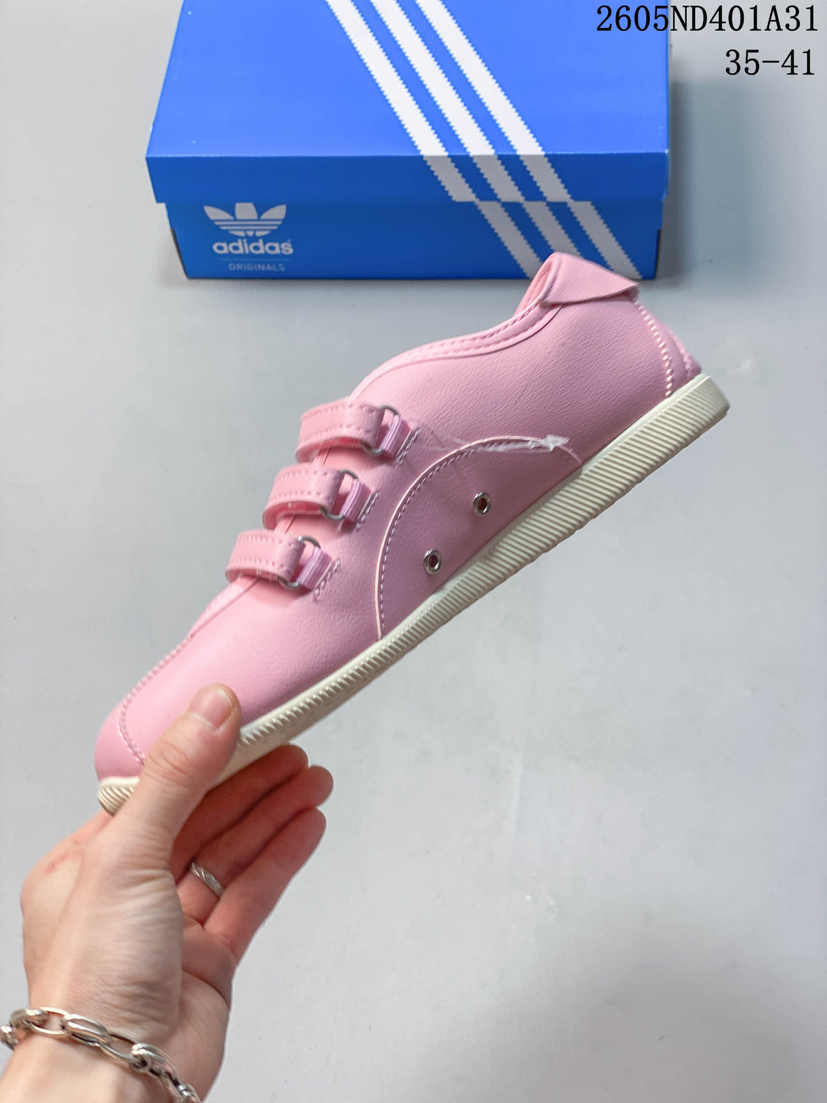 Side view showing three pink straps and white stripes
