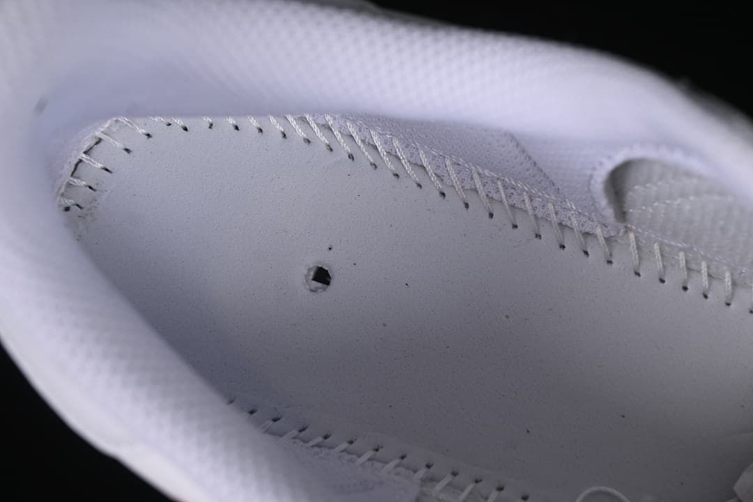 Interior close-up showing stitching and perforations