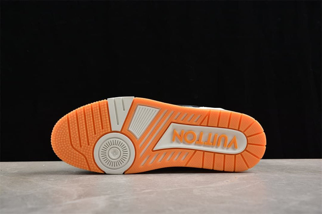 Underside view showing the orange and white patterned outsole